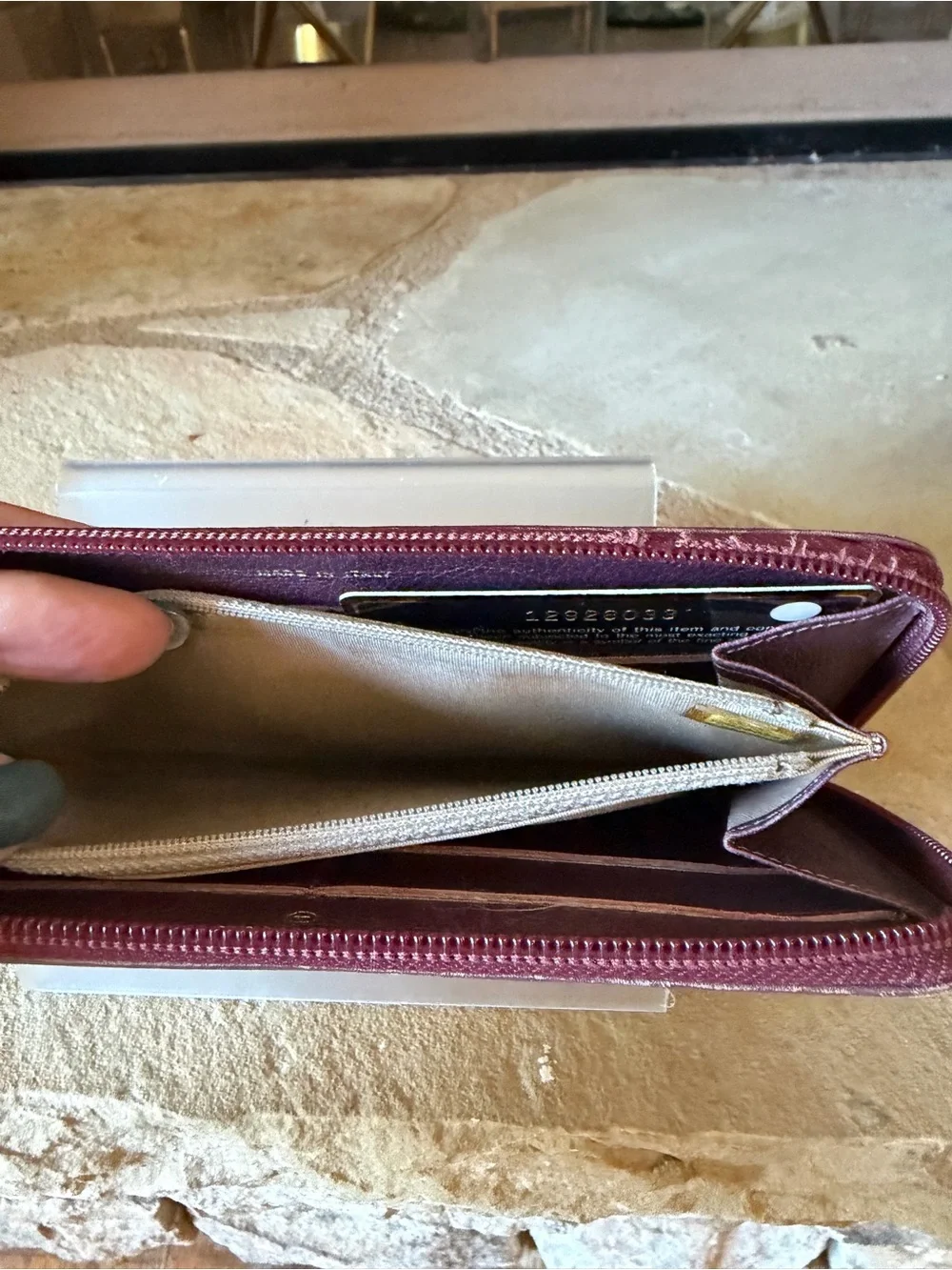 CHANEL Plum Camellia Zip Around Leather Wallet